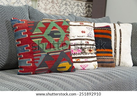 Herringbone sofa with traditional Turkish handmade colorful natural fabric pillows