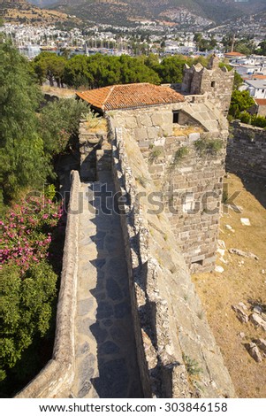 Tower and ramparts of Bodrum Castle located in southwest Turkey in the port city of Bodrum was built from 1402 onwards, by the Knights of St John as the Castle of St. Peter or Petronium