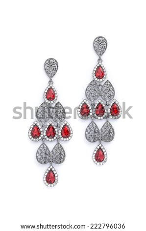 earrings with red rubies on a white background