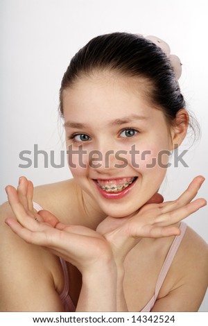 stock photo Smiling Face of teen girl with brackets on her teeth