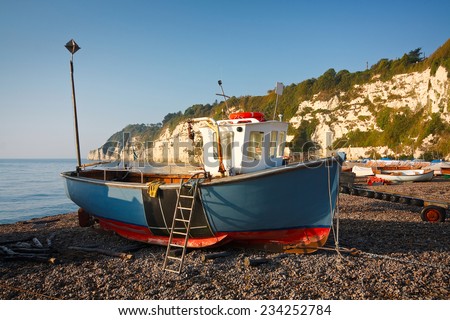 Fishing boat on the beach in Beer, Devon, UK