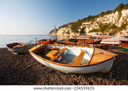 Boats on the beach in Beer, Devon, UK