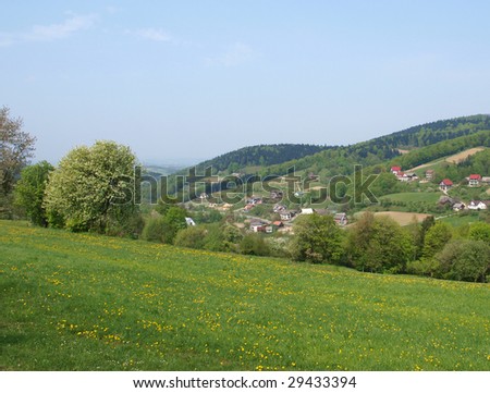 spring small mountain agricultural village - horizontal landscape