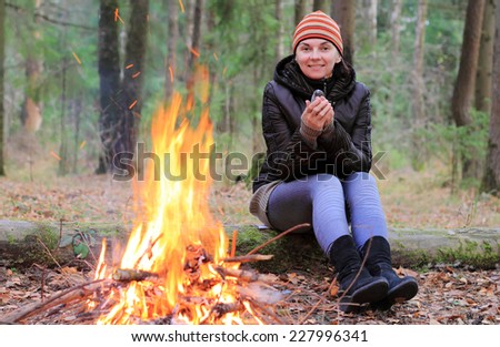 girl near the fire