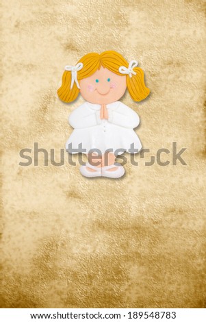 vertical card first communion, funny blond girl in parchment background