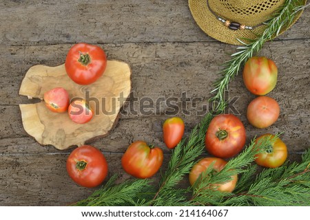 tomatoes organic cultivation in old wooden background