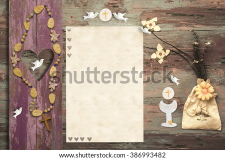 First Communion invitation card, religious symbol on wooden background with copy space to put photo and text