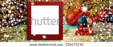Christmas blank photo frame card, Christmas decorations and small Nativity Scene on glitter background