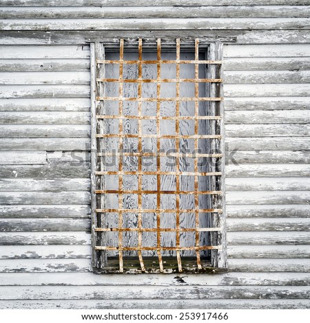 Barred Window of an Old Abandoned House