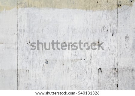 Old Exterior Wood Surface with Peeling White Paint