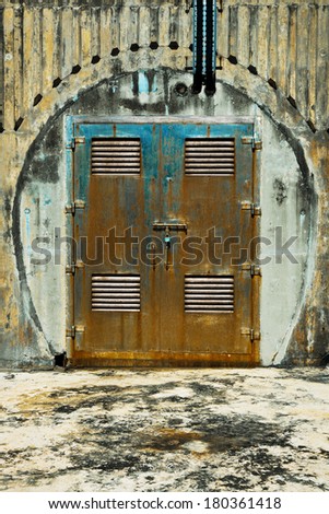 Metal door of rock fortress
