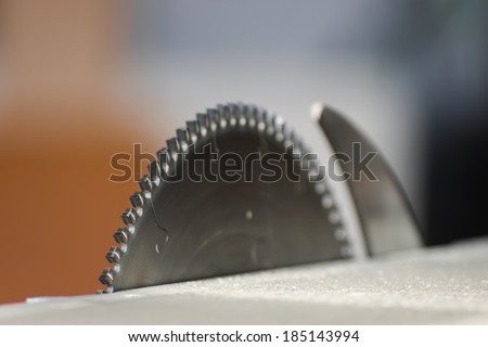 sharp saw blade on a colored background