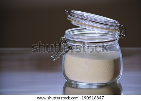 glass jar with white flour