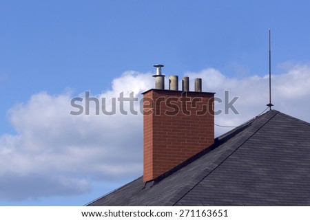 new renovated brick chimney on the house