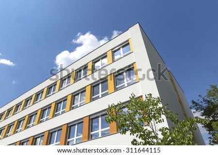 A new school building blue sky