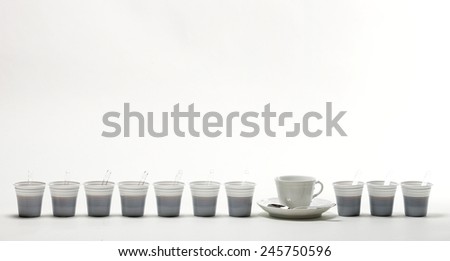Row cups of coffee, white background