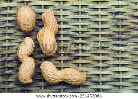 four peanuts with braided background to create a title