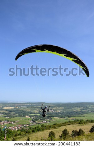 jump with a parachute (parapant) ,panorama with French villages