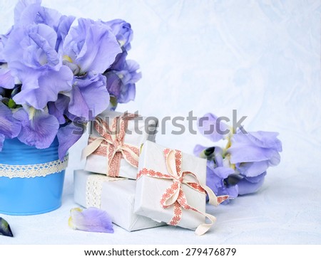 bouquet of flowers and a gift, background for text