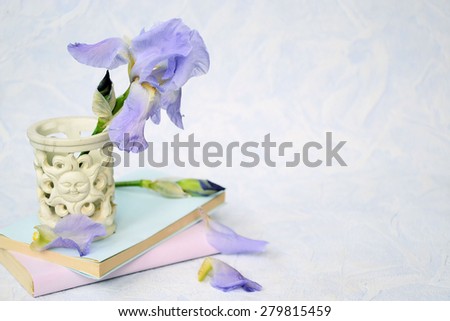 flowers and books in pastel colors