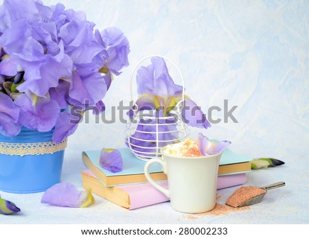 coffee, flowers and books in pastel colors