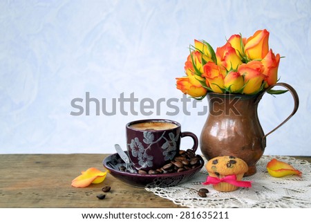 coffee and flowers on a blue background