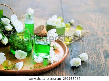 spa concept background with flowers and oils