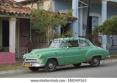 Vinales, Cuba - December 26, 2010: Classic Green car in Vinales. Past international embargoes have meant Cuba has maintained many pre-revolutions vehicles