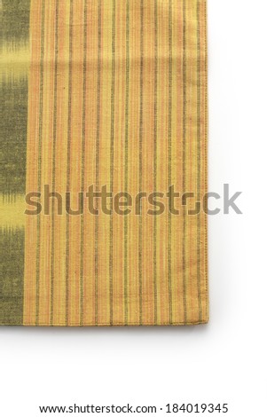yellow pattern fabric from asia on white background