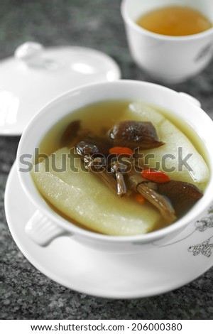 close up chinese vegetarian soup in white cup
