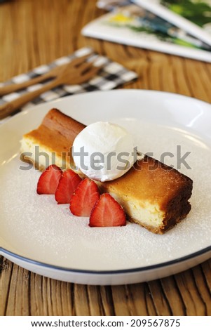 close up strawberry cheese cake in dish