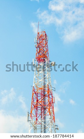 telephone antenna and repeater tower with blue sky background