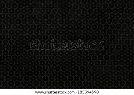 Background and structure of black sequins