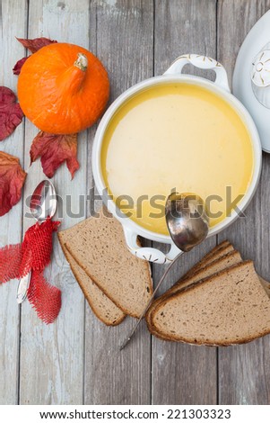 pumpkin soup set 3 a set of pumpkin soup with a pumpkin a spoon and a soup bowl