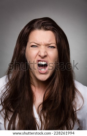 faces woman darl background - rage