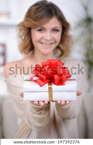 Portrait of cute girl receive gift box, enjoying present at home, romantic relationship, Valentine day, love and happiness concept
