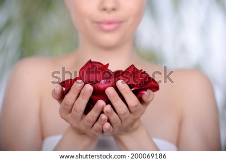 Health and Beauty. picture of beautiful woman with rose petals