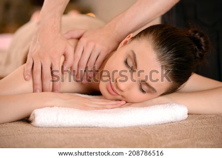Woman on spa massage of body in the beauty salon.