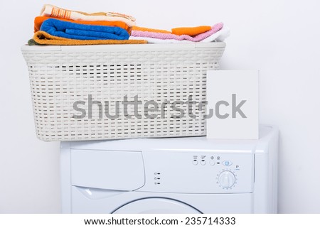Washing machine, is isolated on white background, cleaning agents and clothes.