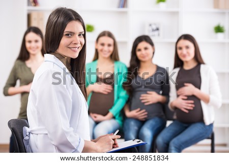 Pregnant women are listening to doctor at antenatal class at the hospital