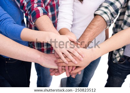 Close-up hands of a group of people. Friendship.