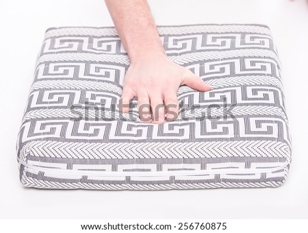 Hands of man with nice mattress that supported you to sleep well all night.
