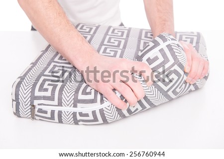 Hands of man with nice mattress that supported you to sleep well all night.