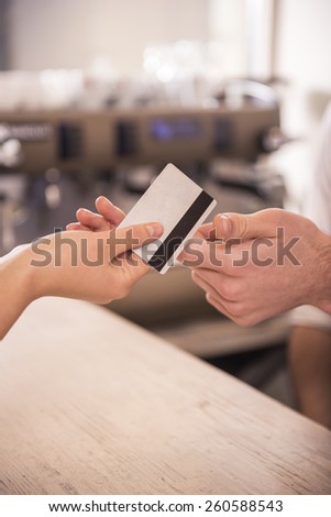 Close-up of credit card in humans hand.