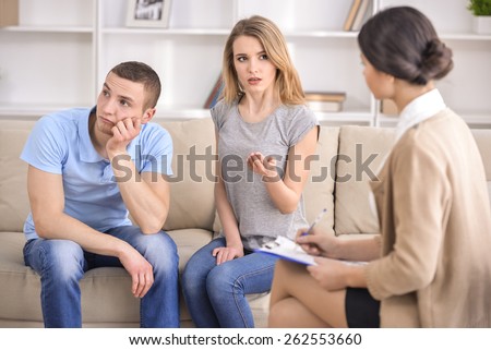 Woman talking with psychologist about the problems in the family.