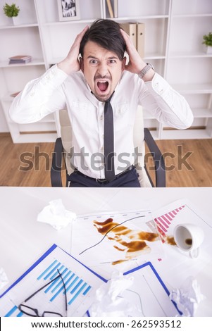 Businessman angry over spilled coffee on documents