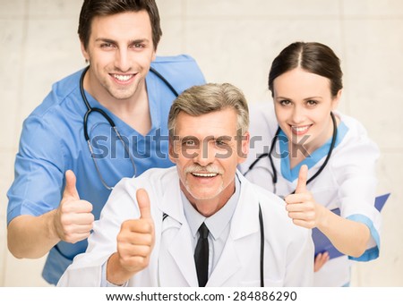 Group of doctors over white background at hospital.
