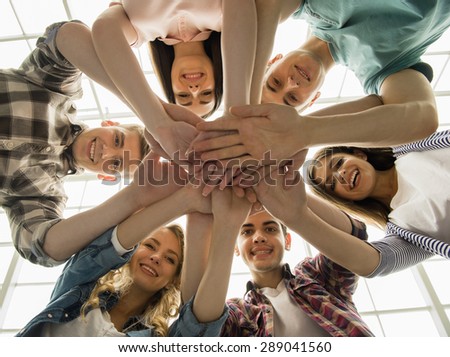 Circle of trust. Group of people sitting in circle and supporting each other.