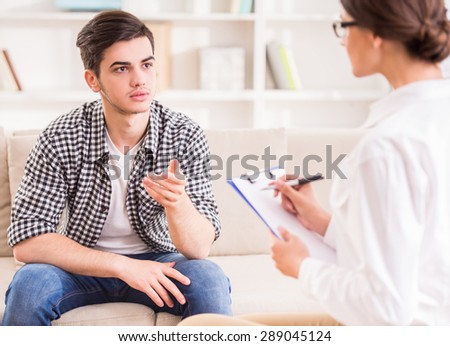 Psychologist having session with her patient in her private consulting room.