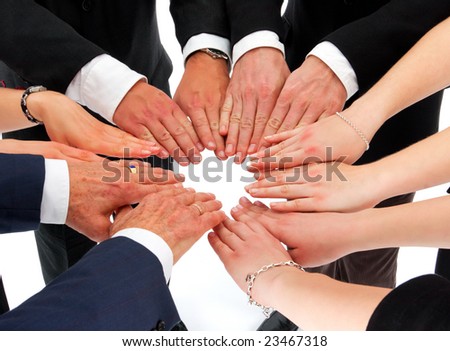 business people putting their hands together building a circle (concept for agreement)